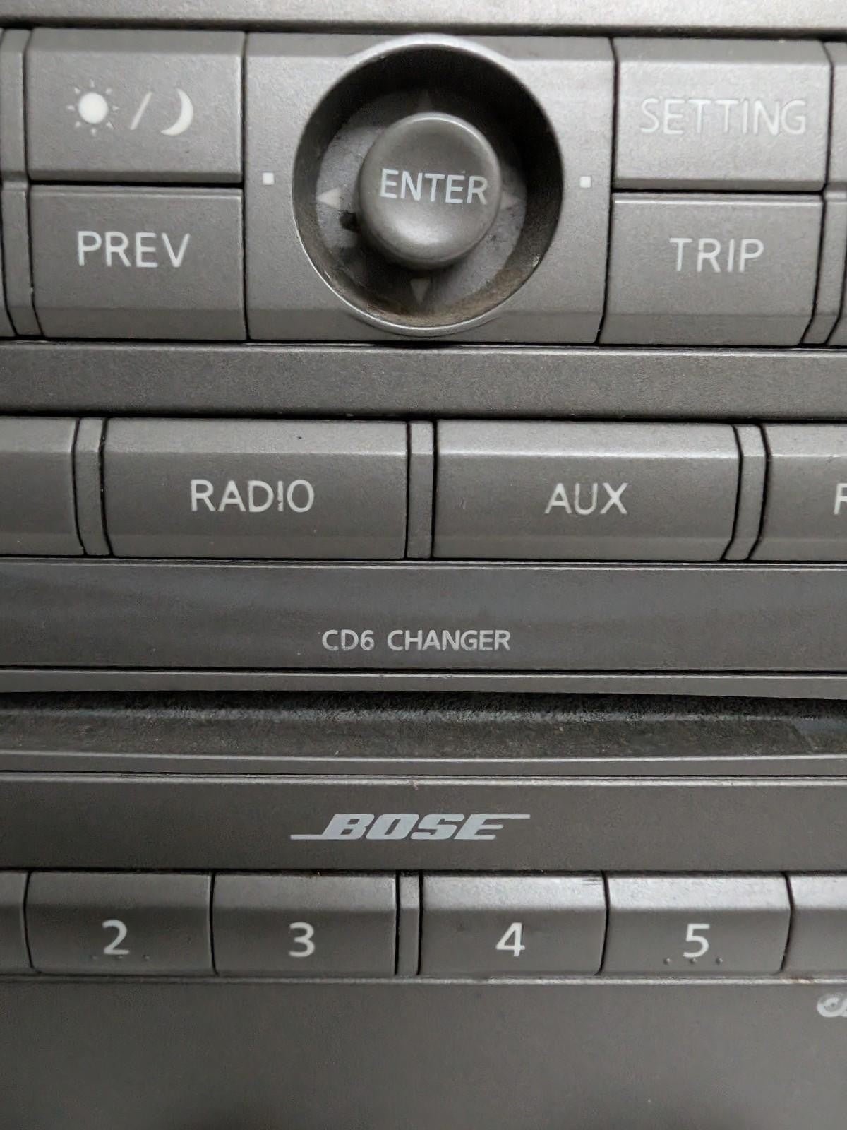 04 05 06 07 Nissan Titan Armada  Navigation  Climate Control Radio Bezel