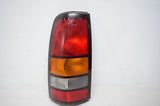 03 04 05 06 GMC SIERRA LEFT DRIVER TAIL LIGHT