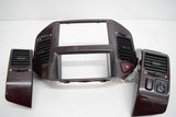 01 02 MITSUBISHI MONTERO LIMITED WOODGRAIN DASH BEZEL WITH EVENTS