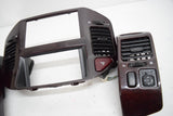 01 02 MITSUBISHI MONTERO LIMITED WOODGRAIN DASH BEZEL WITH EVENTS